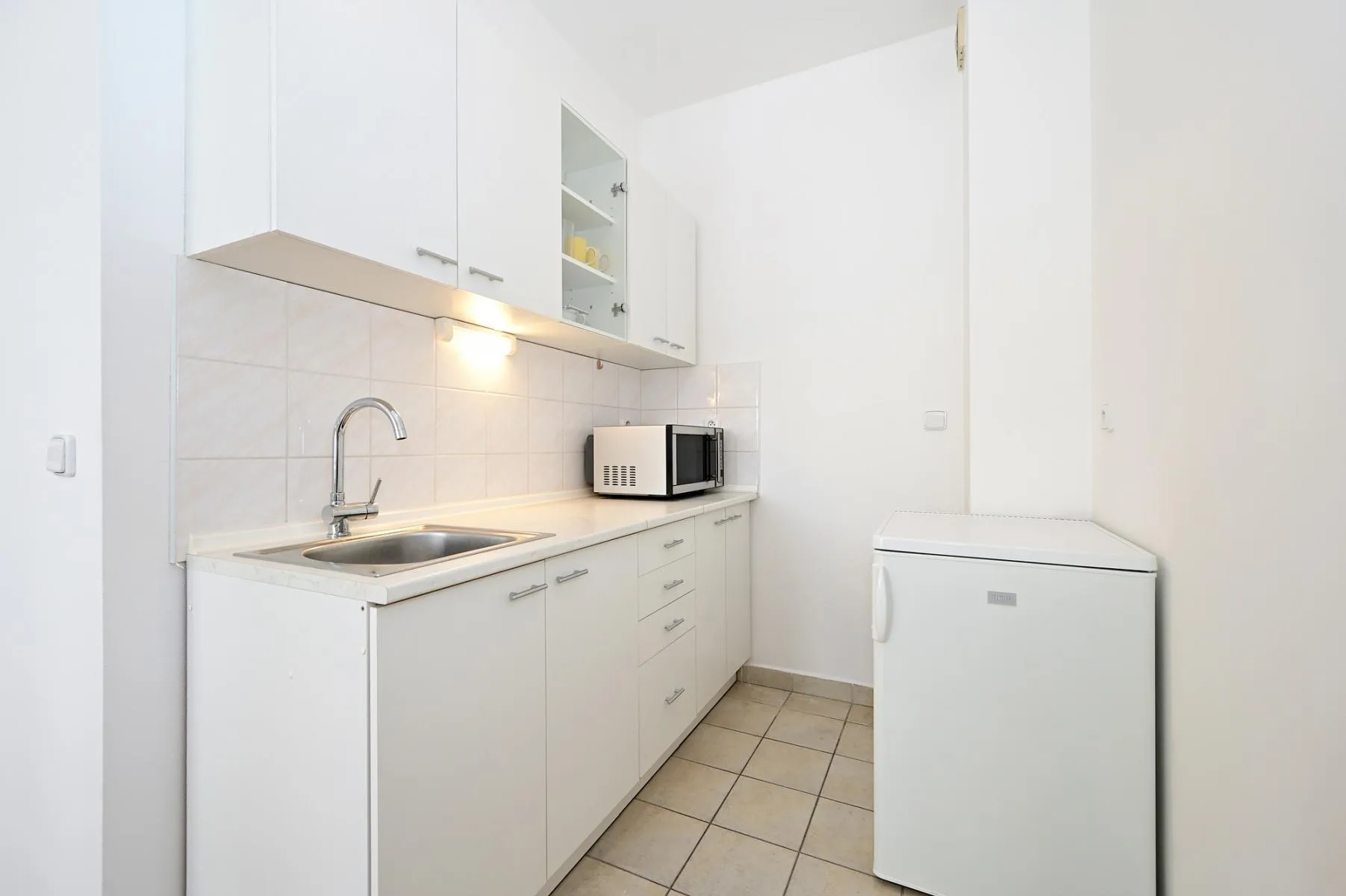Byt 1+kk, 35 m&sup2;, balkon a sklep, ul. Za Černým mostem, Praha 14  Kyje